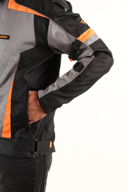 Waterproof Lone Ranger Addon Pro Max Jacket (Black Orange) for men, designed for comfort and protection during long rides.